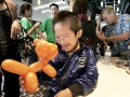Shaomao Chen, 6, of Rowland Heights and who has down syndrome, gets a balloon character during the Foundation for Disabled Youths (FFDY), event Saturday, September 24, 2011 with Edison Chinese Connection, from Southern California Edison, at Seasons Place in Industry.  FFDY, a grassroots organization in the San Gabriel Valley, serves Chinese American families with disabled children. (SGVN/Staff Photo by Sarah Reingewirtz/SVCITY)
